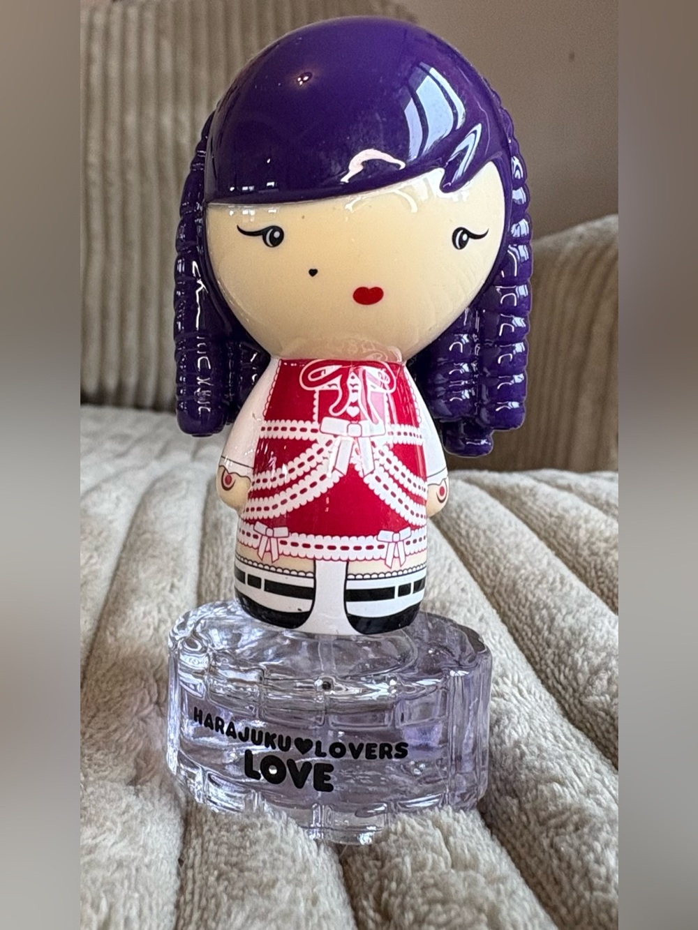 Harajuku Lovers Purple-Headed Doll with Red Dress Accent. Perfume by Gwen Stepha